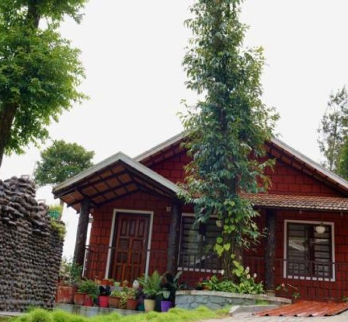 Sakleshpur Homestay cottage surrounded by coffee estate greenery at Planters County
